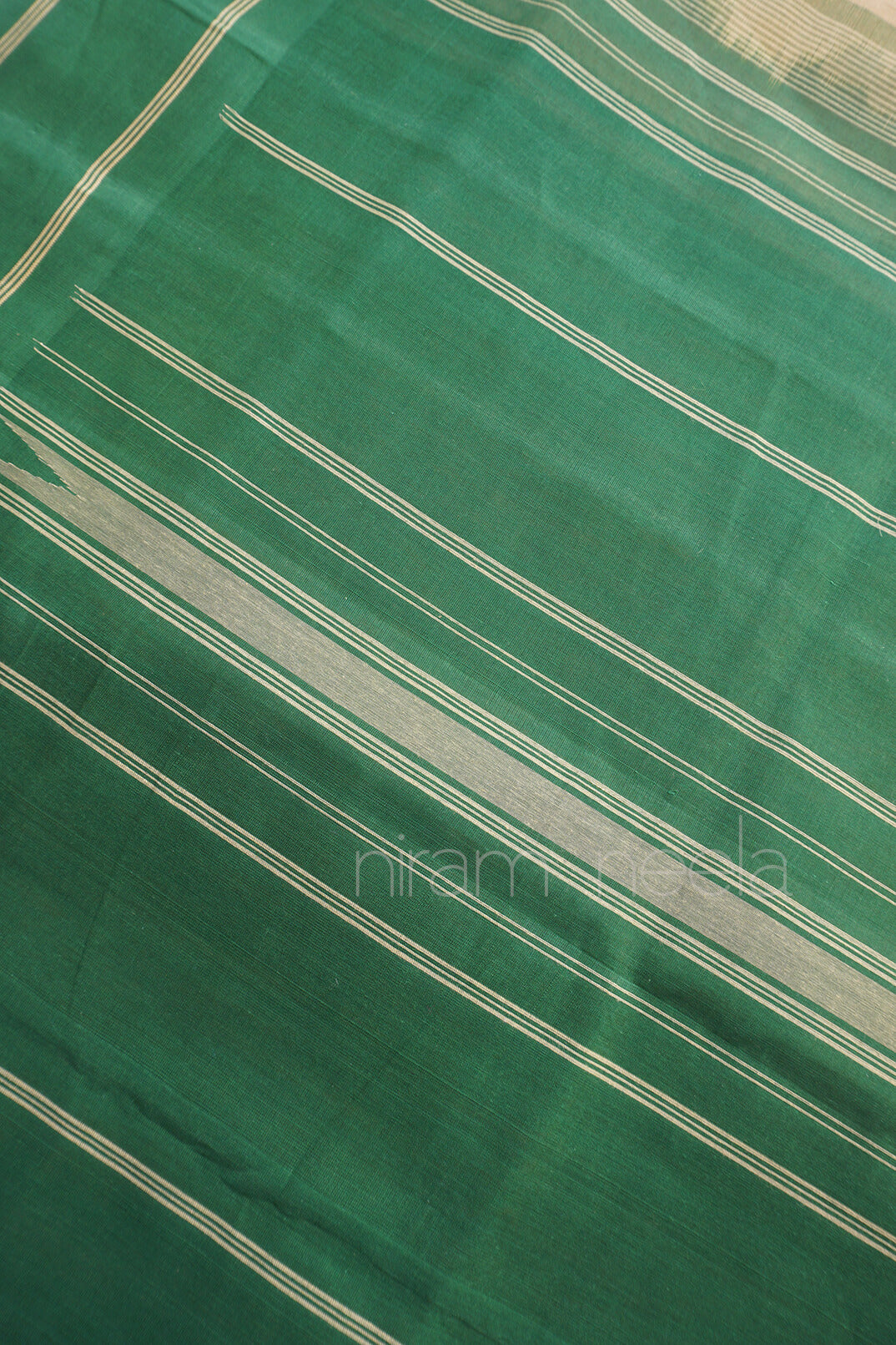 Cream and green handloom Godavari cotton saree from Niram Neela