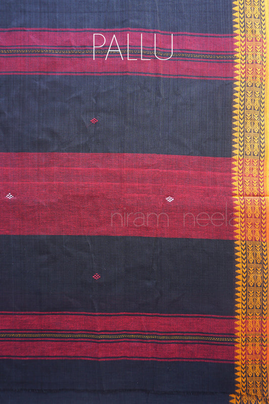 A close-up of a traditional Indian saree pallu fabric, featuring a black body with bold red horizontal stripes, small geometric motifs, and a wide yellow patterned border on the right side.