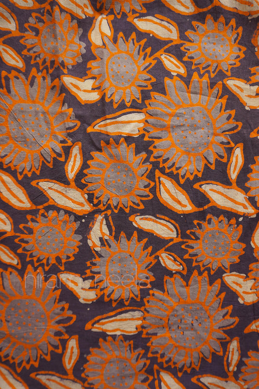 Brown and orange Batik sunflower print cotton fabric | Niram Neela