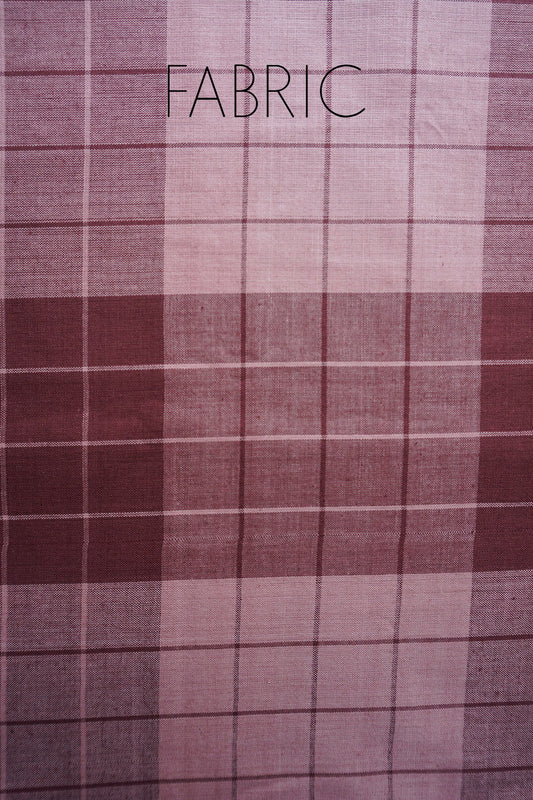Plaid fabric with a checkered pattern in shades of purple and gray.