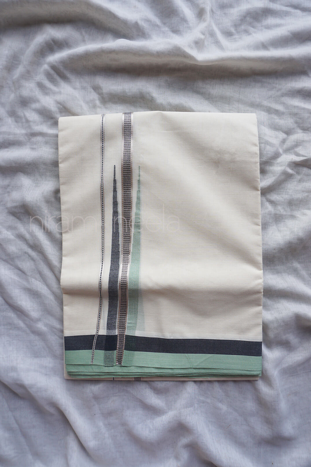 Ivory, green and silver chutti double mundu | Niram Neela