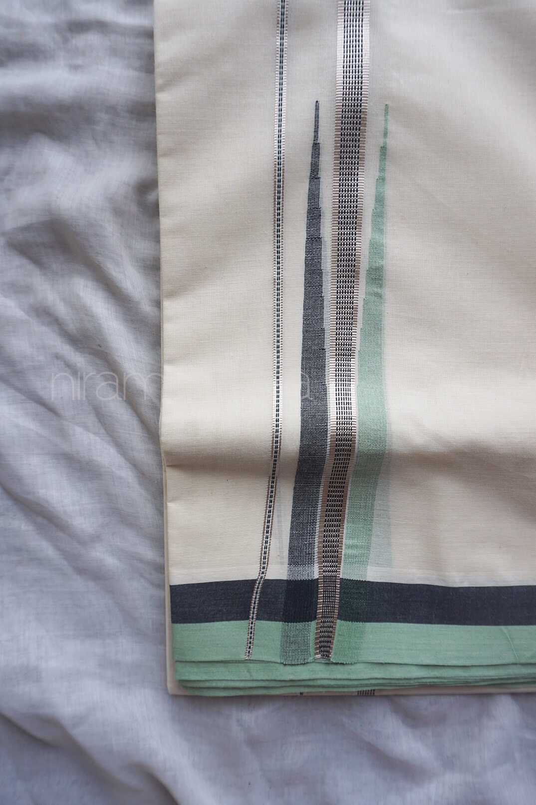 Ivory, green and silver chutti double mundu | Niram Neela