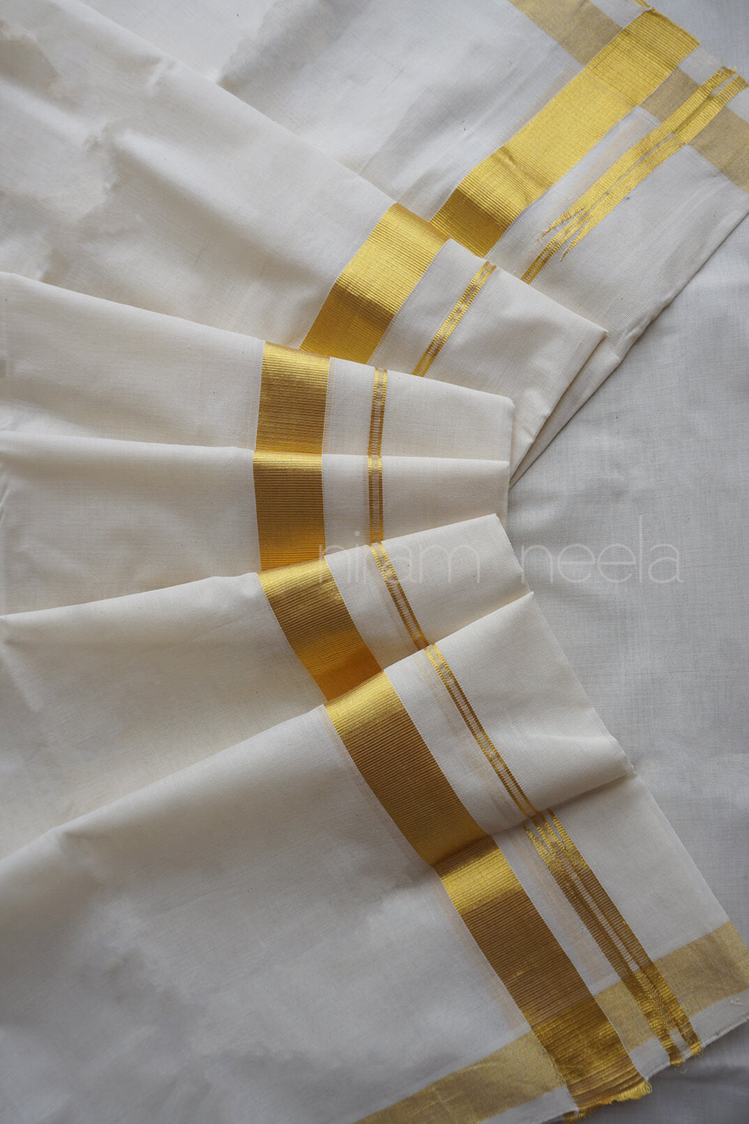Ivory and gold chutti double mundu | Niram Neela