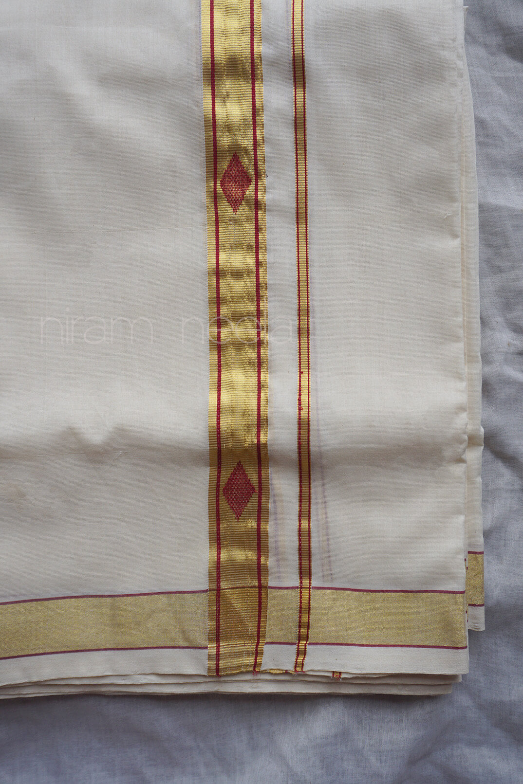 Ivory and red kasavu double mundu | Niram Neela