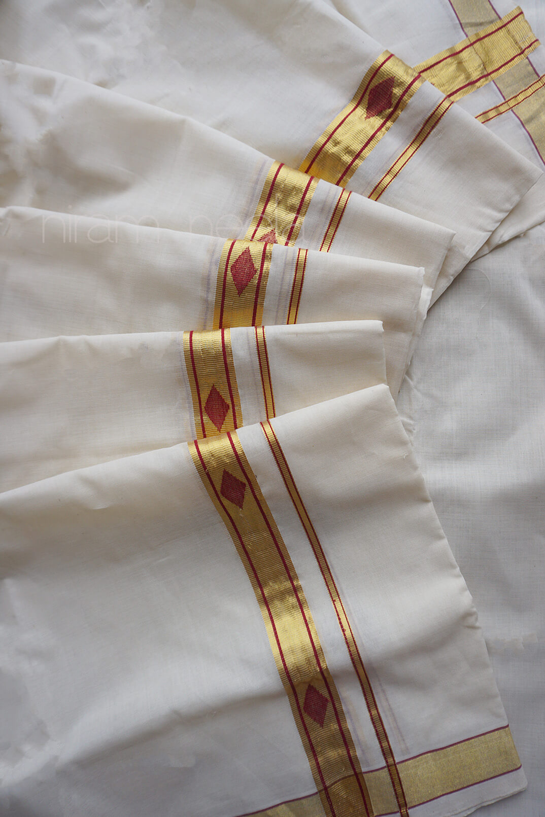 Ivory and red kasavu double mundu | Niram Neela