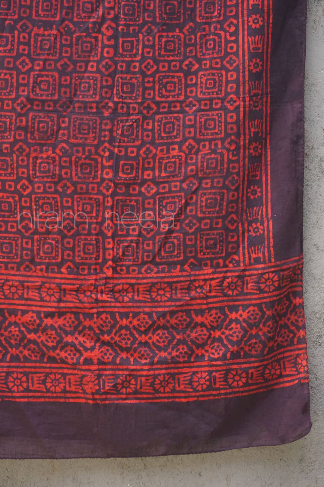 Close up of Maroon and brown geometric batik cotton stole | Niram Neela