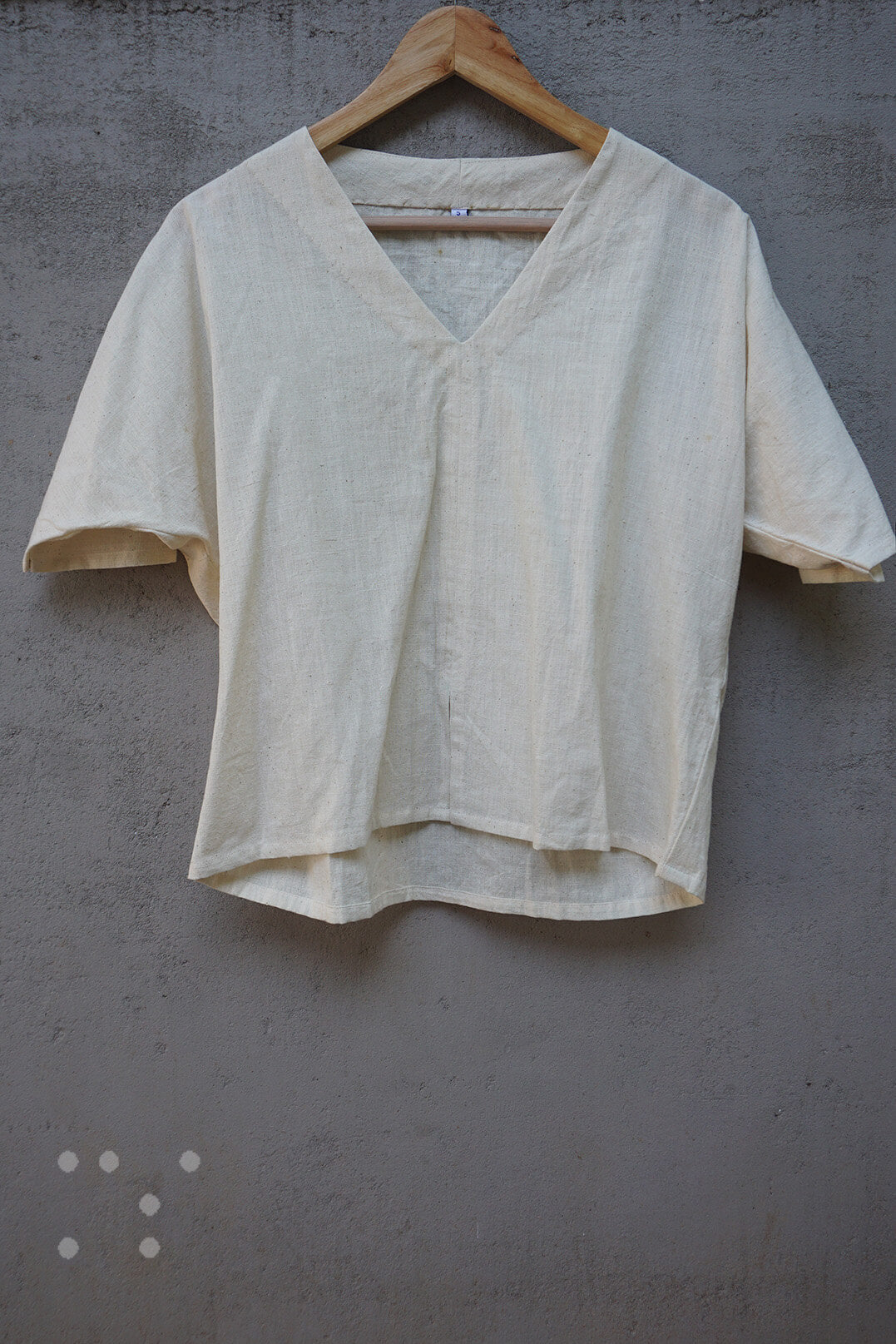 Cream top in display | Braille by Niram Neela