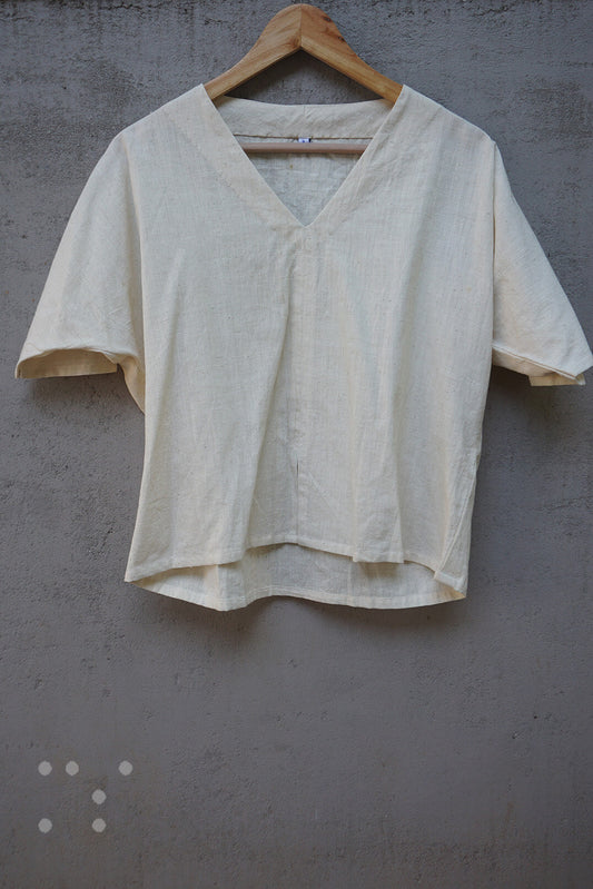 Cream top in display | Braille by Niram Neela