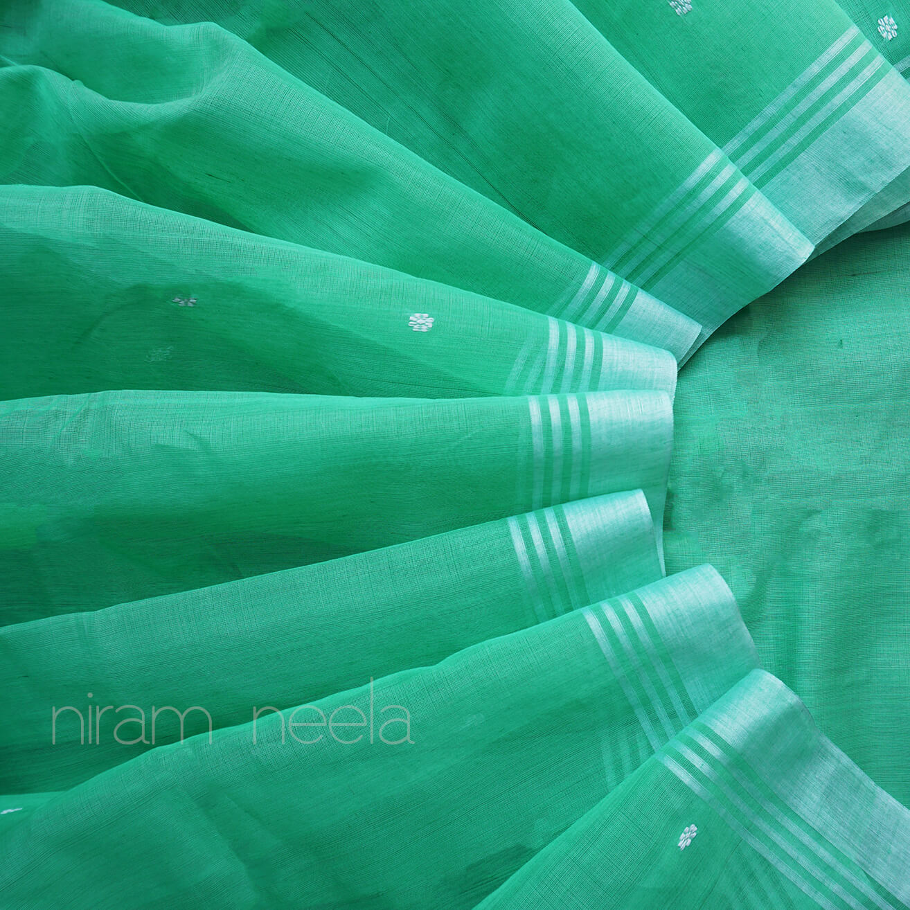 Green and white Chanderi cotton saree - Niram Neela