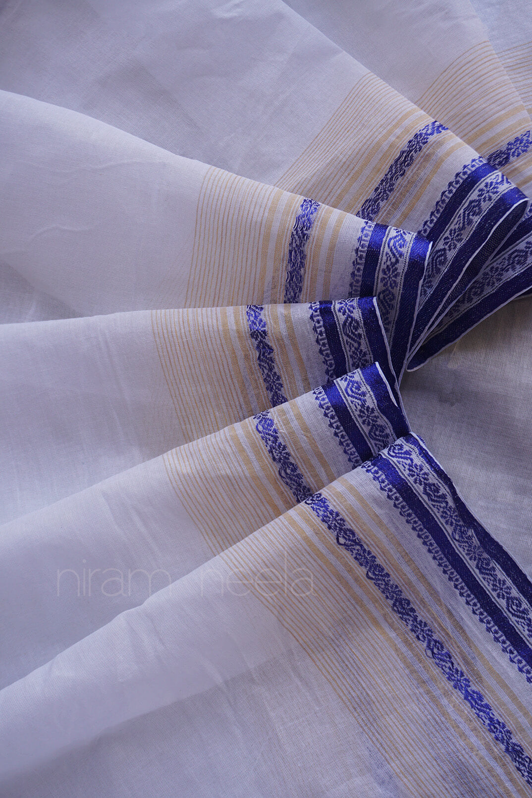 White and blue cotton Dhaniakhali dhoti | Niram Neela