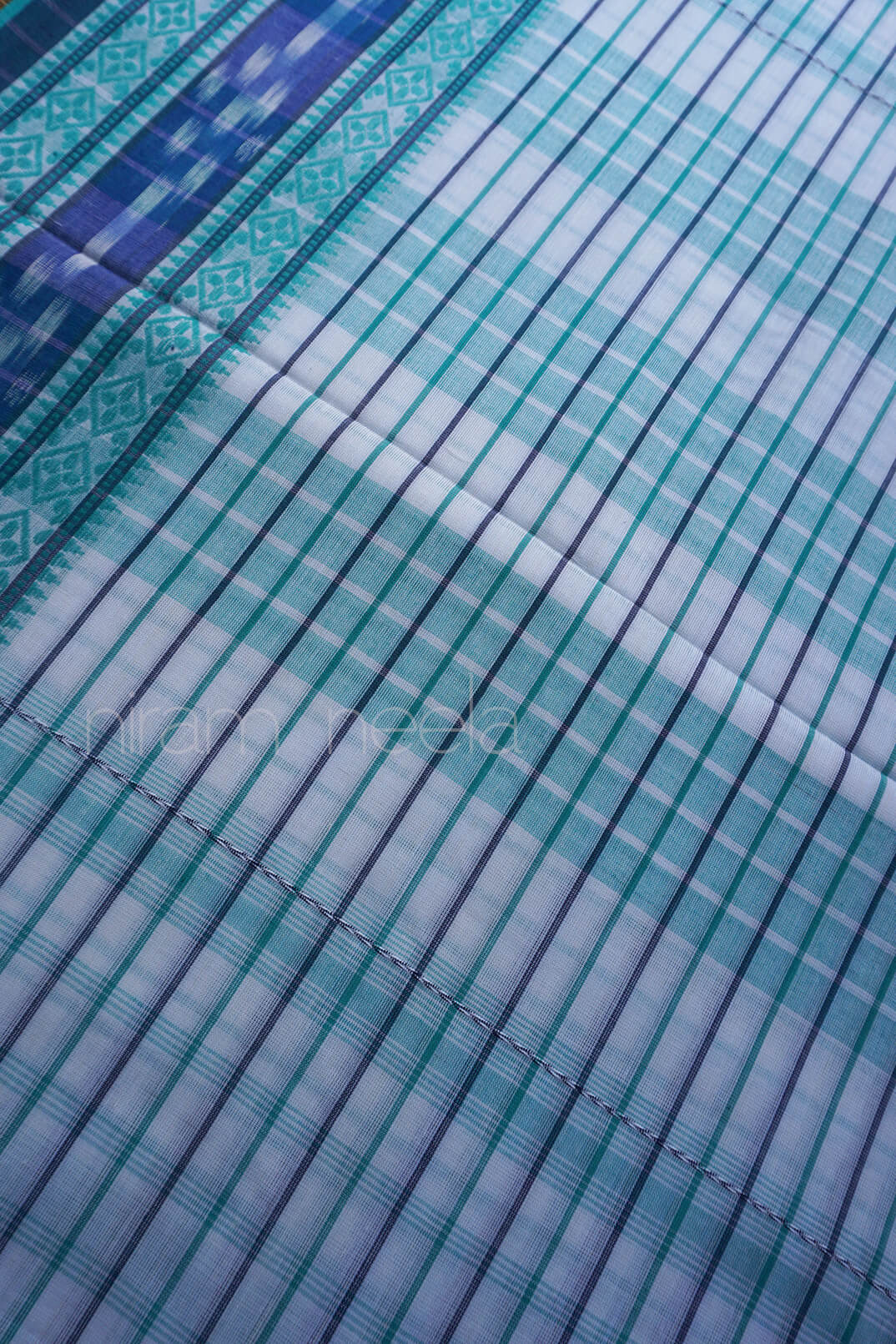 White and teal check Dhaniakhali saree | Niram Neela