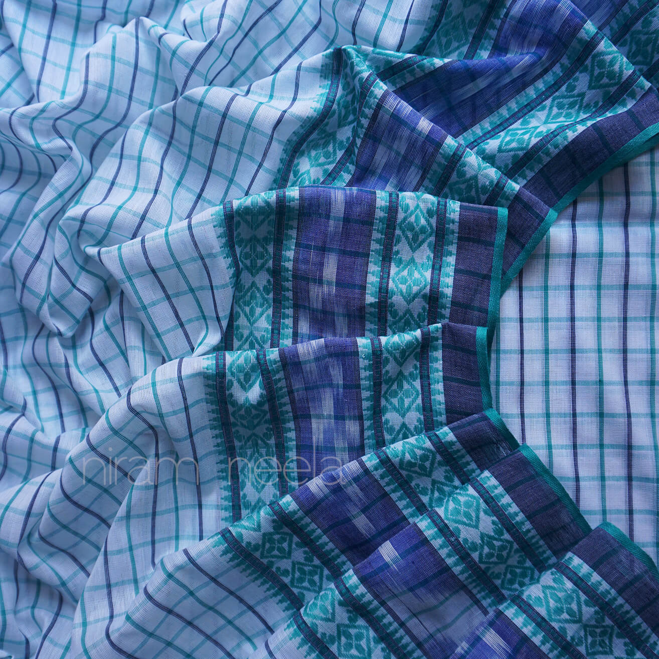 White and teal check Dhaniakhali saree | Niram Neela