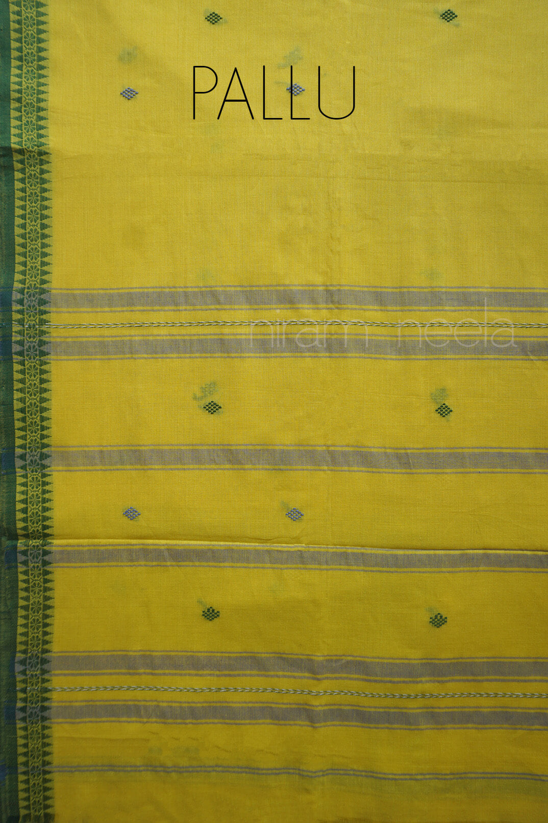 A close-up of a yellow saree with a dark green patterned border on the left, horizontal gray stripes, small green diamond motifs, and the word 'PALLU' printed at the top.