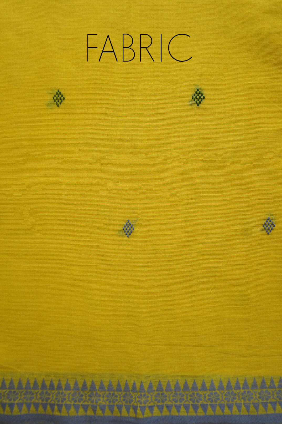 Yellow fabric with a powder blue geometric border and small blue diamond motifs, labeled 'FABRIC' at the top.
