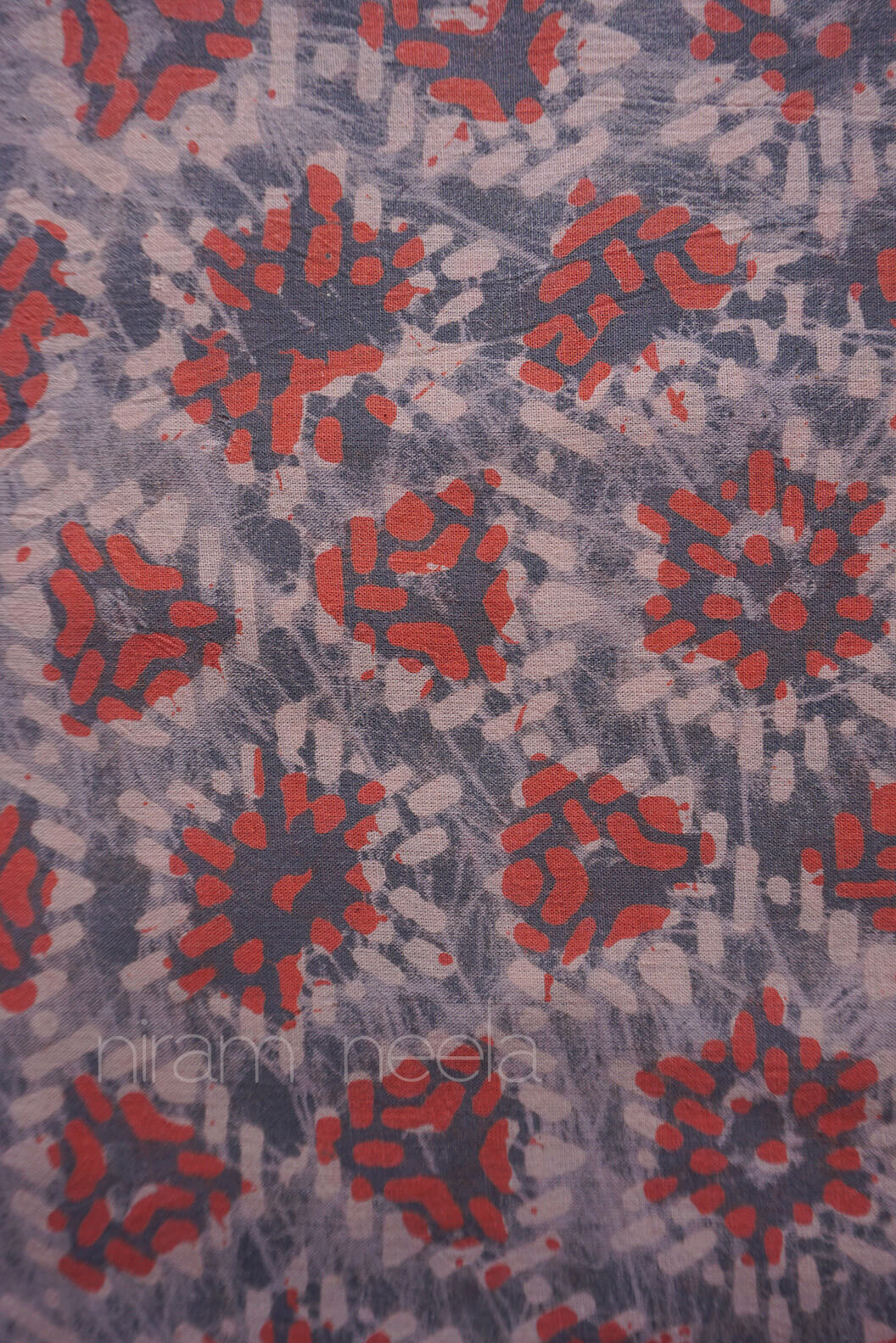 Grey and orange Batik geometric print cotton fabric | Niram Neela