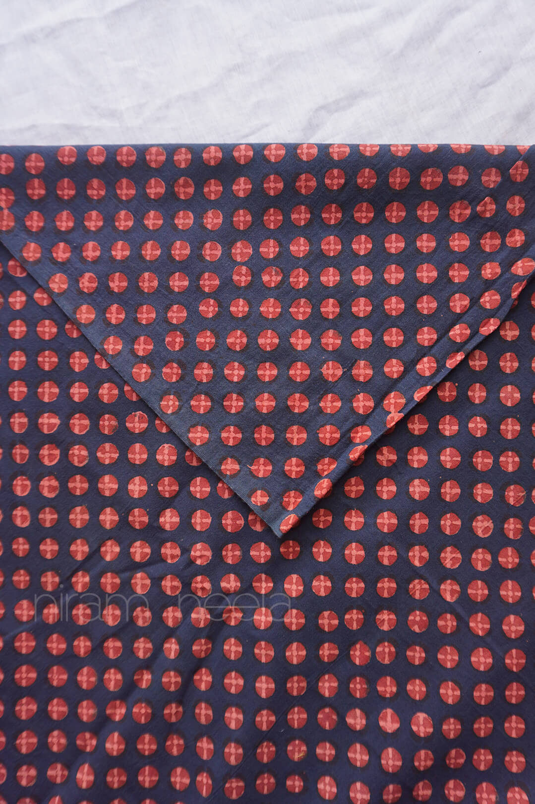 Indigo blue and orange Pharad print cotton fabric | Niram Neela