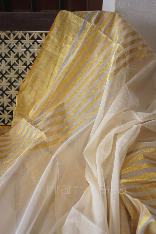 Ivory and golden striped Kasavu saree | Niram Neela