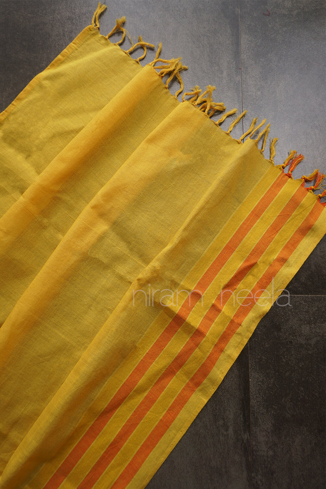 Yellow and orange handwoven Kannur cotton stole | Niram Neela