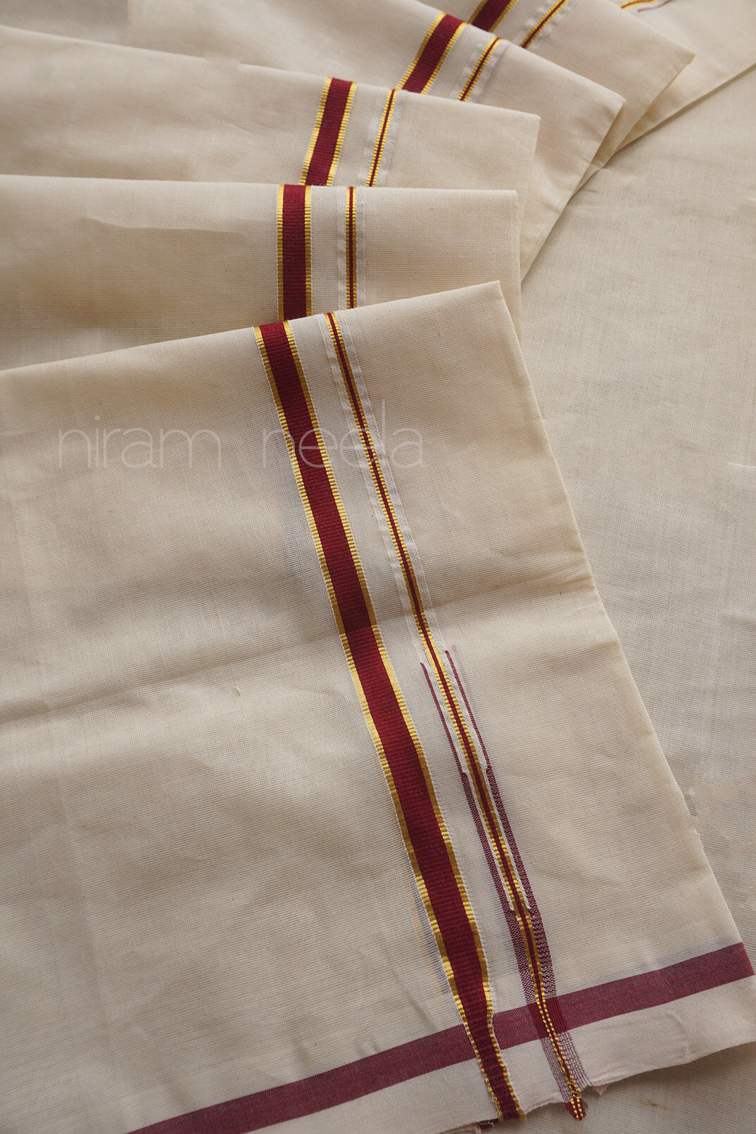 Ivory and dark red puliyilakkara kasavu set mundu
