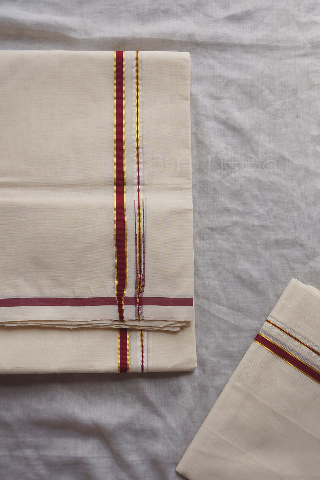 Ivory and dark red puliyilakkara kasavu set mundu