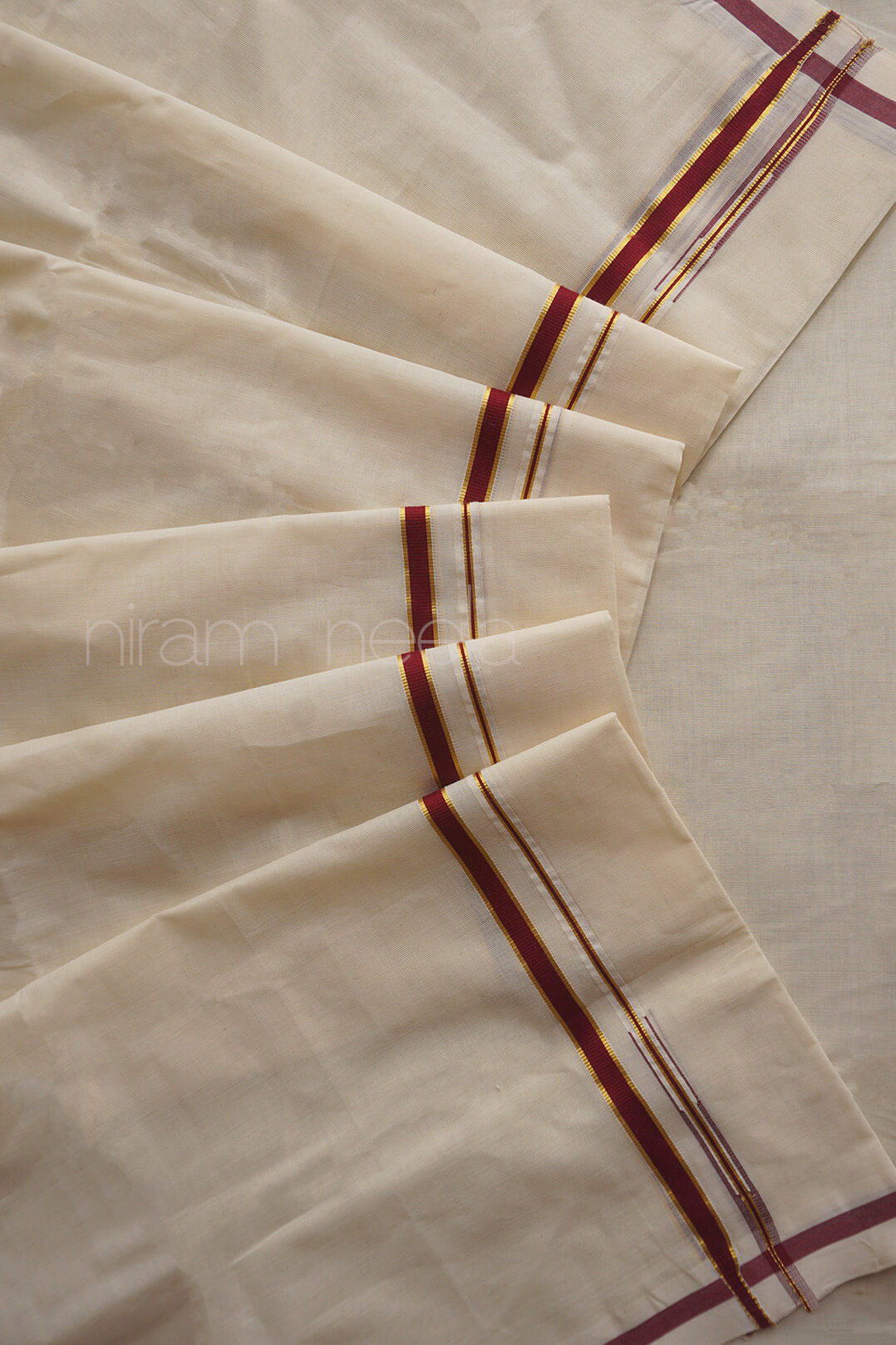 Ivory and dark red puliyilakkara kasavu set mundu