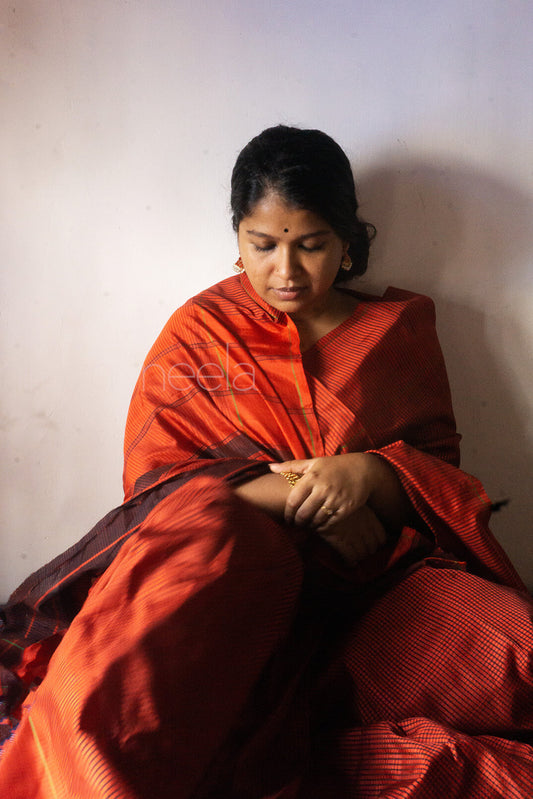 Orange and black Koorainadu silk cotton saree