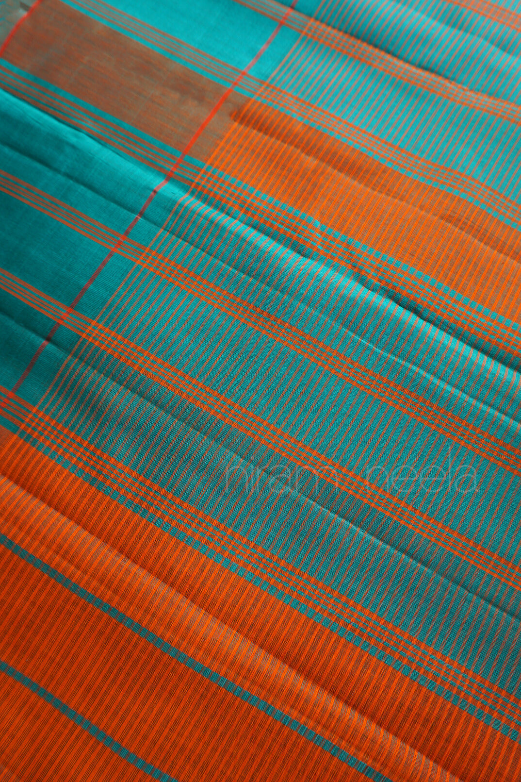 Green and orange Koorainadu checkered silk cotton saree from Niram Neela