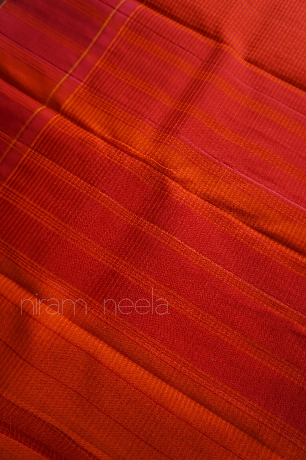 Orange and red Koorainadu silk cotton saree | Niram Neela