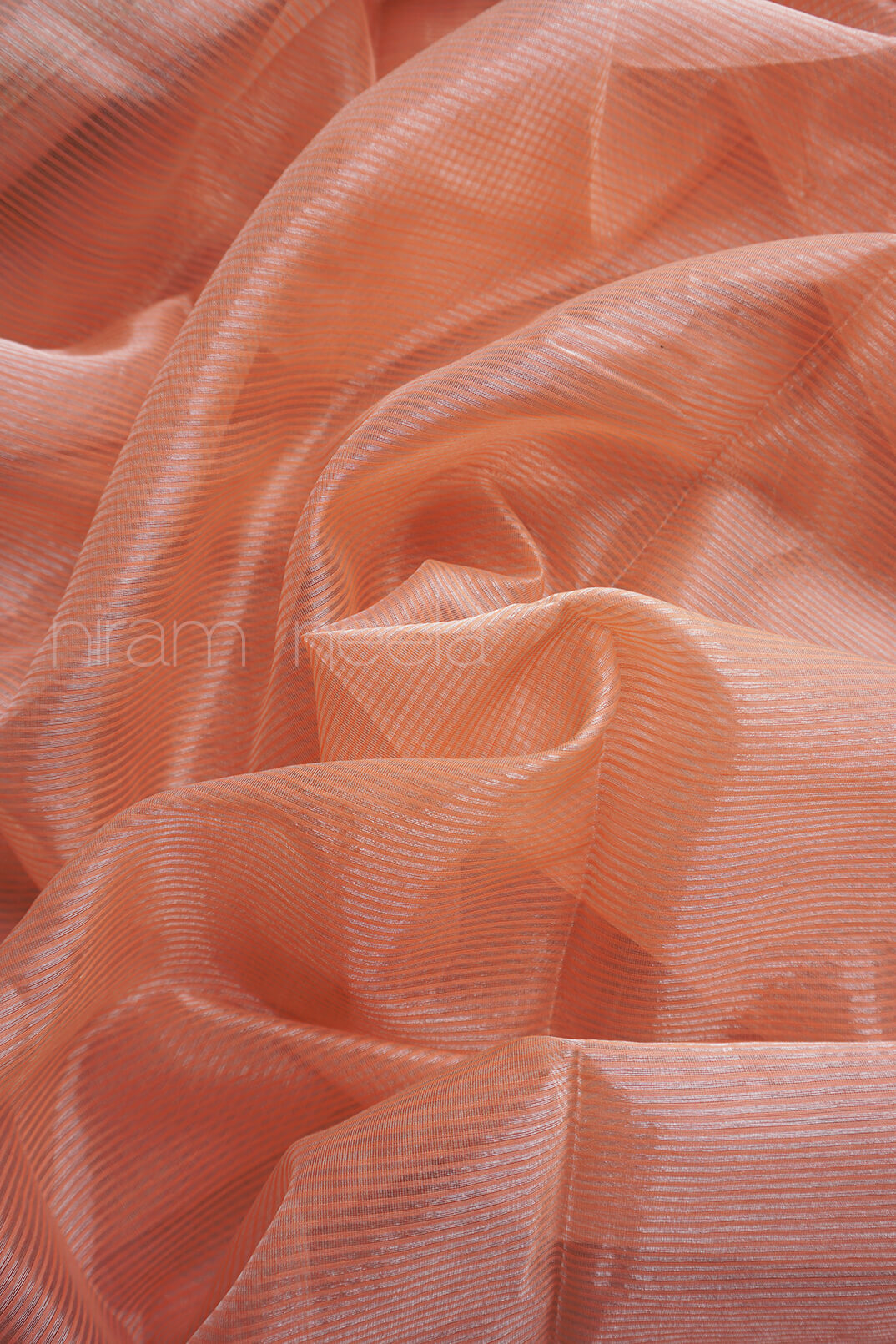 Peach Maheshwari silk cotton tissue saree | Festive edit by Niram Neela