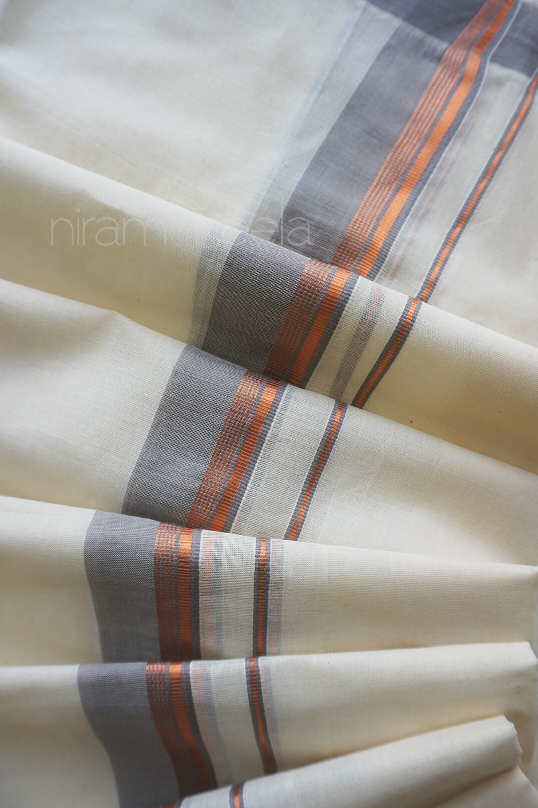 Ivory and grey handloom double mundu for gents by Niram Neela