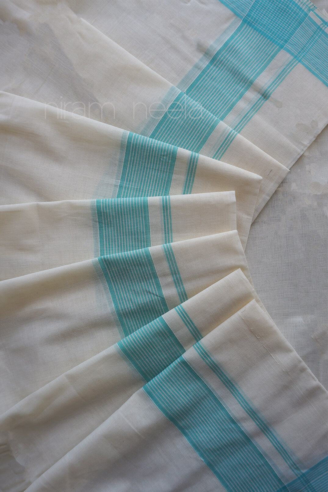 Ivory and teal double mundu for men | Niram Neela
