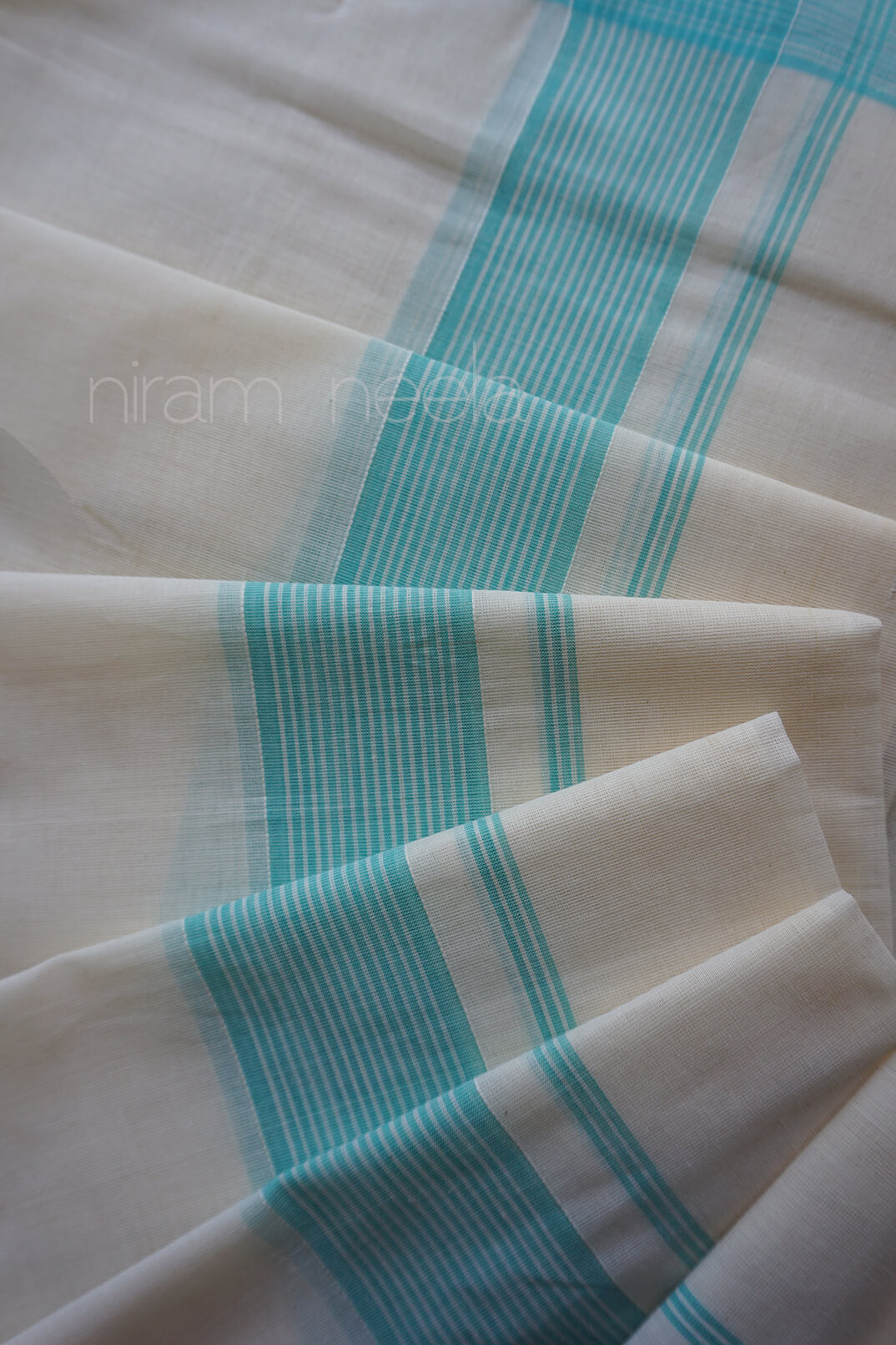 Ivory and teal double mundu for men | Niram Neela