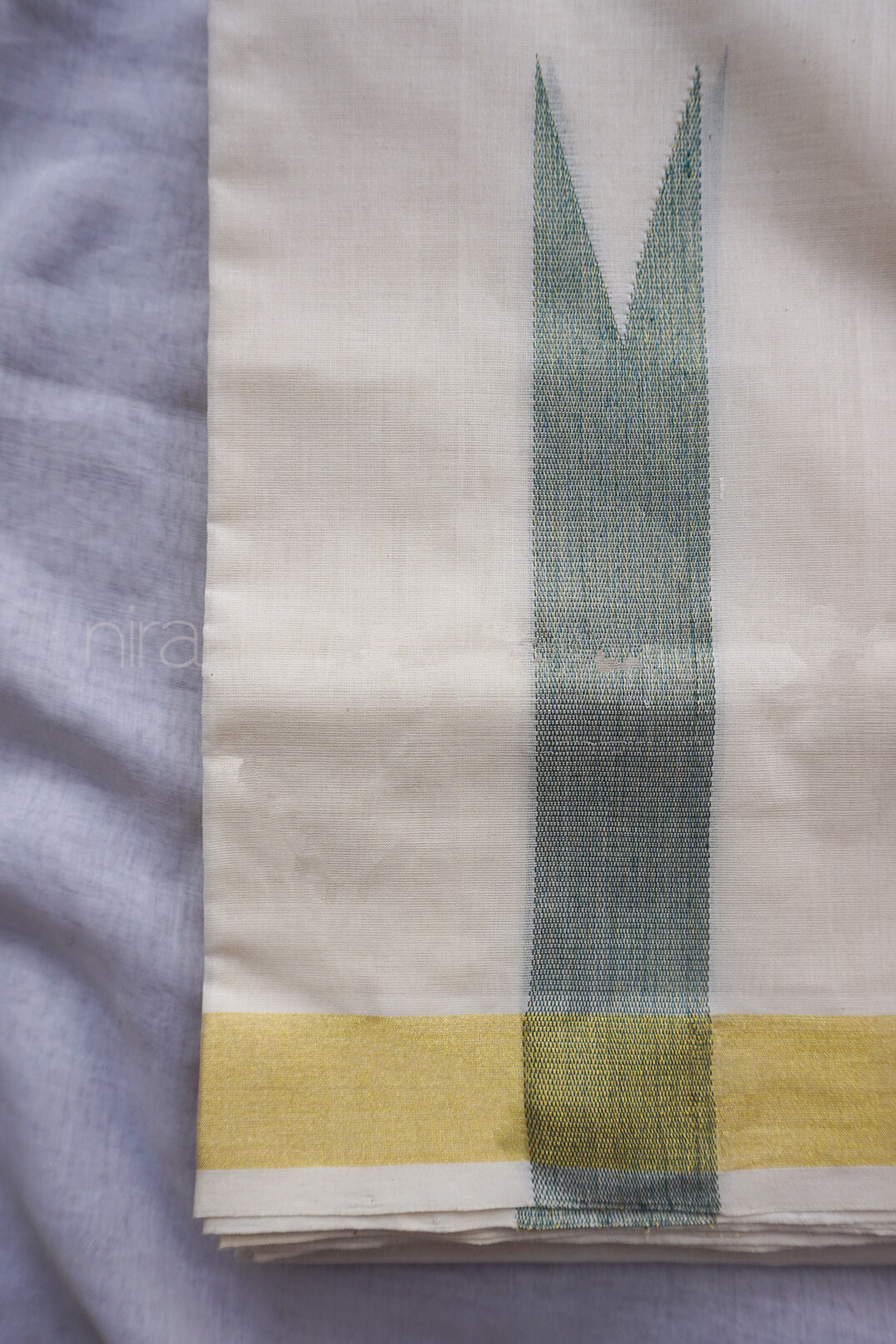 Ivory and green chutti double mundu for men from Niram Neela
