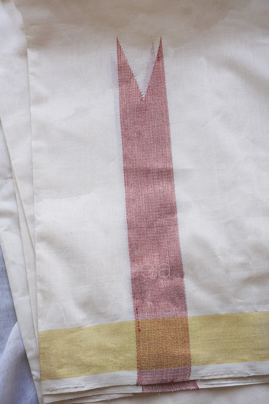 Ivory and red chutti double mundu for men from Niram Neela