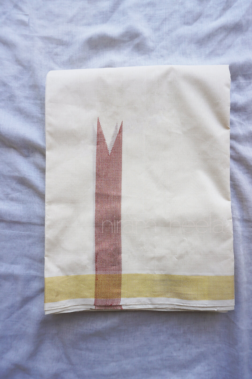 Ivory and red chutti double mundu for men from Niram Neela