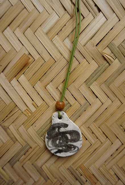 Ivory and black swirl handmade ceramic neckpiece - Niram Neela