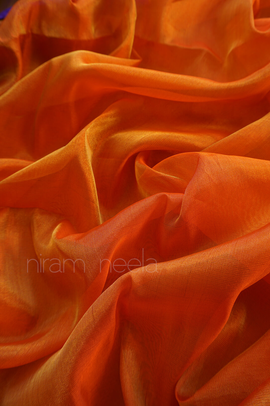 Orange and violet uppada silk tissue saree from Niram Neela