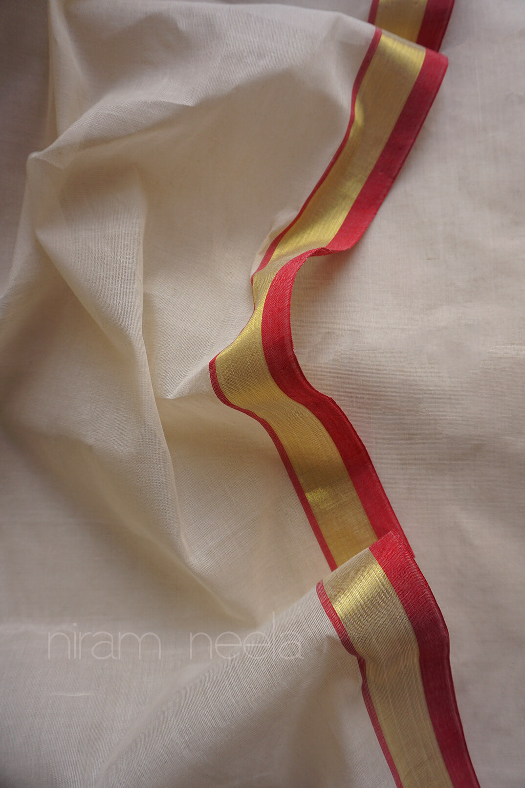 Ivory and red handloom Venkatagiri jamdani cotton parrot saree from Niram Neela